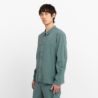 side view of ciele athletics CCJacket unisex running jacket from the Lifestyle Edition collection, in silver pine color, on a model