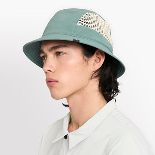 side view of ciele athletics GOBucket unisex running bucket hat from the Lifestyle Edition collection, in silver pine color, on a model