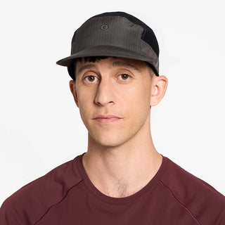 front view of ciele athletics GOCap Icon Circle C unisex running hat in shadowcast on a model