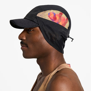 side view of ciele athletics GOCap solar unisex running hat from the Elite collection in shadowsphinx color, on a model