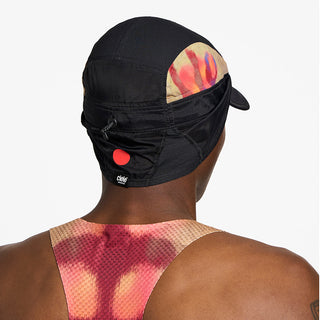 back view of ciele athletics GOCap solar unisex running hat from the Elite collection in shadowsphinx color, on a model