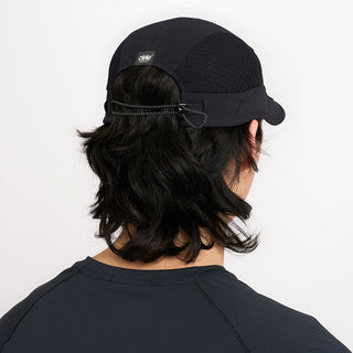 back view of ciele athletics new FSTCap ethereal unisex running hat from the Elite collection in shadowcast color, on a model