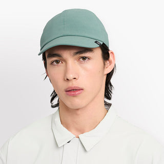 front view of ciele athletics CRWCap short brim unisex running hat with shorter brim from the Lifestyle Edition collection, in silver pine color, on a model