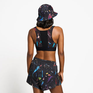 back view of ciele athletics QCKBra running bra from the summer nights limited edition, on a model