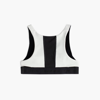 back view of ciele athletics QCKBra running bra in light grey