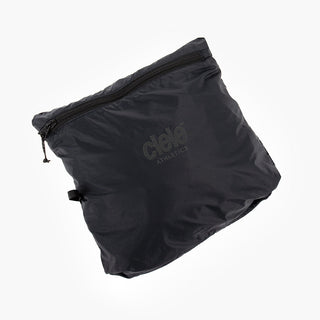 view of the ciele athletics VNTJacket lightweight running jacket for women in shadowcast color when folded in one of it's pocket