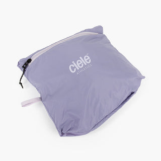 view of the ciele athletics VNTJacket lightweight running jacket for women in grape color when folded in one of it's pocket