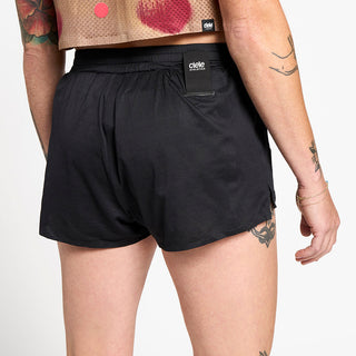 close up back view of the ciele athletics lightweight, race ready and performance driven short  for womens named RDShort in shadowsphinx color