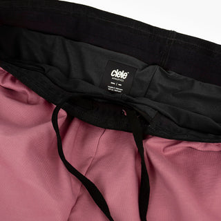 close view of the elastic waistband on the ciele athletics DLYShort 4 inch with a long brief in deco rose color