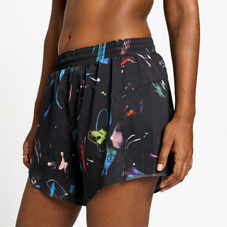 side view of ciele athletics ATShort 4 inch with liner short from the summer nights limited edition capsule, on a model