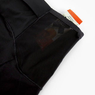 detail view of the side mesh pocket for snacks on the ciele athletics race ready and performance driven 3.5 inches tights short for womens named CRGTight in shadowsphinx color