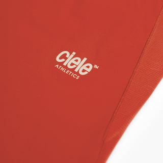 close view of the reflective logo on the ciele athletics DLYTSinglet lightweight and performance driven singlet in clay