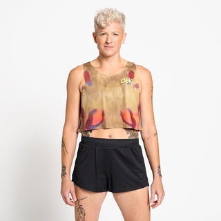 front view of the ciele athletics lightweight, race ready and performance driven Singlet for womens named RDCRPSinglet in sphinx color, on a model