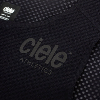 close up of the ciele logo of the ciele athletics lightweight, race ready and performance driven Singlet for womens named RDCRPSinglet in shadowsphinx color