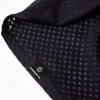 close up of the ciele branding of the ciele athletics lightweight, race ready and performance driven Singlet for womens named RDCRPSinglet in shadowsphinx color