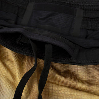 detail view of the drawstring of the ciele athletics lightweight, race ready and performance driven short named RDShort in sphinx color