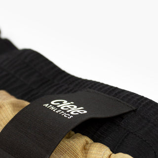 detail view of the fabric of the ciele athletics lightweight, race ready and performance driven short named RDShort in sphinx color