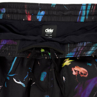 close view of the waistband of the ciele athletics ATShort 5 inch with liner short from the summer nights limited edition capsule, on a model