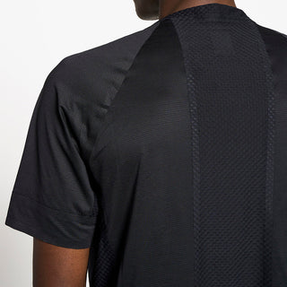 back details of the ciele athletics lightweight, race ready and performance driven T-Shirt named RCDTShirt in shadowsphinx color, on a model