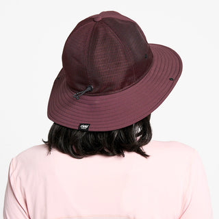 back view of the ciele athletics TRLBucket unisex running bucket hat in dark wine red color, on a model