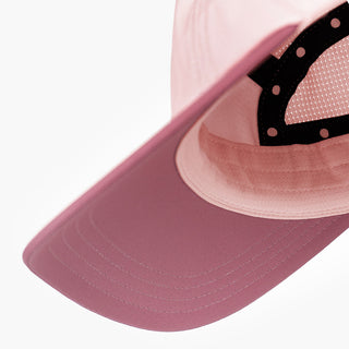 underbrim view of the ciele athletics GOCap with a curved brim unisex running hat in peachskin color