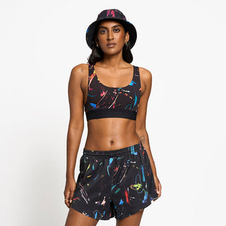front view of ciele athletics QCKBra running bra from the summer nights limited edition, on a model