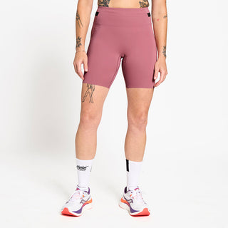 front view of ciele athletics FSTTight short running short in deco rose on a model
